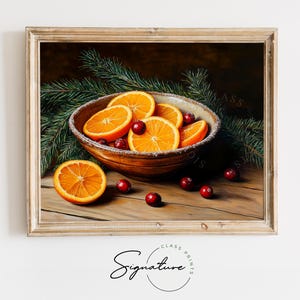 May include: A rustic wooden table with a bowl of orange slices and cranberries. The bowl is made of brown pottery and has a white rim. The oranges are arranged in a circle around the cranberries. The table is covered in a light brown wood grain. There are pine branches in the background.