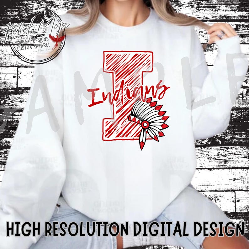 May include: White sweatshirt with a red and white graphic of a capital letter 'I' with the word 'Indians' above it. A red and white headdress is below the letter 'I'.