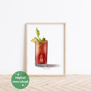 Puede incluir: Impresión en acuarela de un cóctel Bloody Mary en un vaso alto, adornado con apio, una rodaja de limón y una aceituna. La bebida es de color rojo vibrante. La impresión está en un marco de madera e incluye el texto "Digital Download".