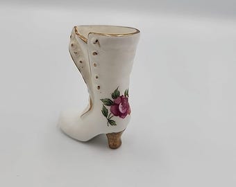 Figura de porcelana japonesa de bota vintage con flor, 2" de borde dorado