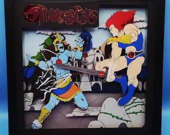 Thundercats Lion-O vs Mumm-Ra 12x12in shadowbox