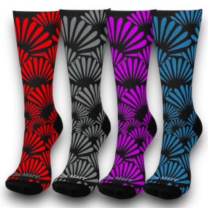 May include: Four pairs of colorful socks with a black background and a floral pattern. The socks are red, gray, purple, and blue.