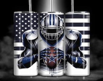 May include: A white tumbler with a design of an American football player wearing a blue and white jersey with a star on the chest. The player is holding a football and is standing in front of an American flag background.