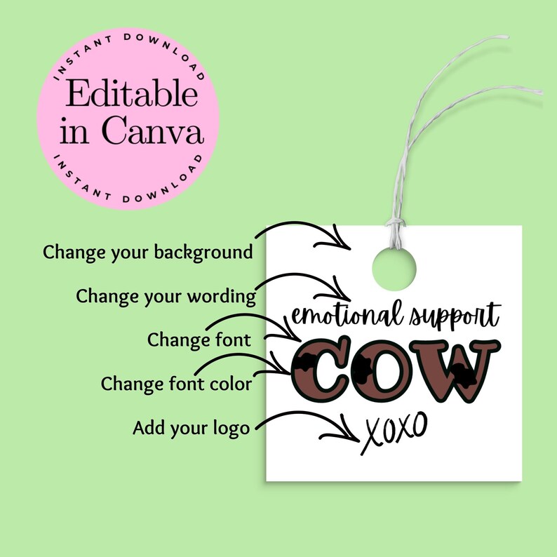 May include: A white tag with brown text that says "emotional support cow" with black cow spots. The text "XOXO" is below the cow text. The tag has a hole punched in the top and a string attached.