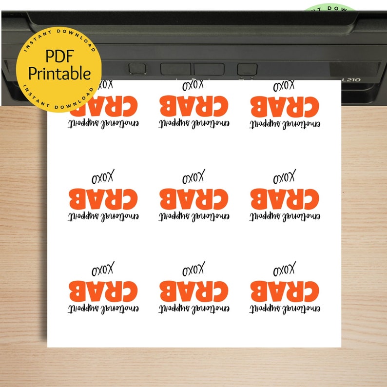 May include: Nine printable gift tags with the text "emotional support crab" and "xoxo" in orange and black text.