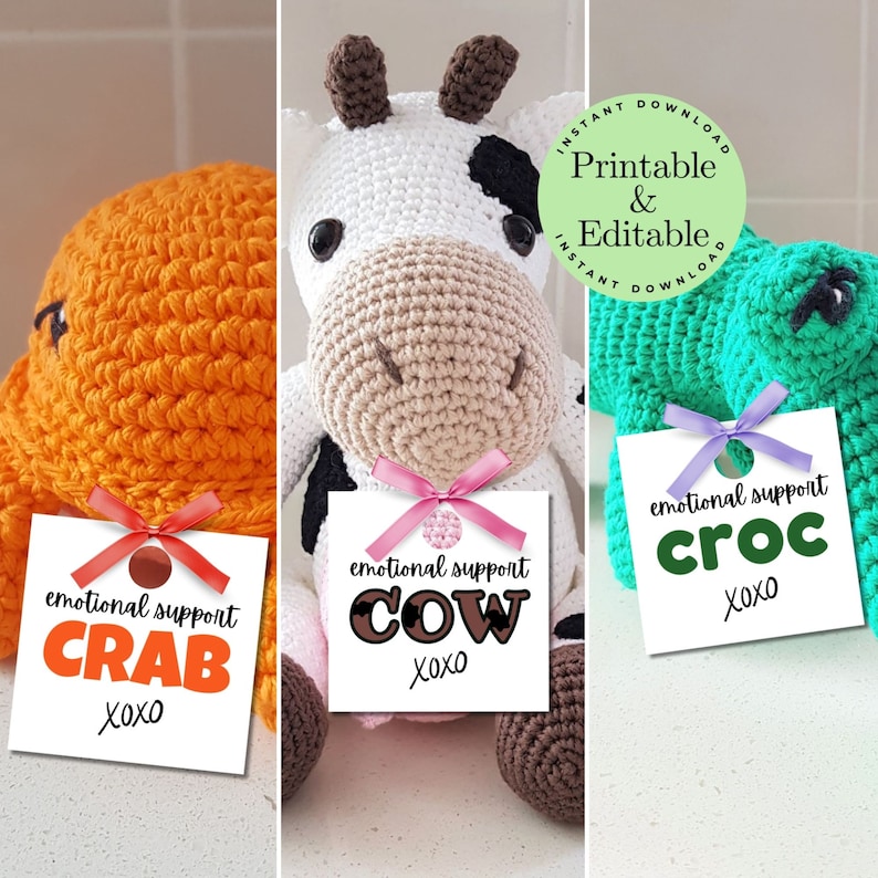 May include: Three crocheted stuffed animals with tags that say "emotional support crab", "emotional support cow", and "emotional support croc".