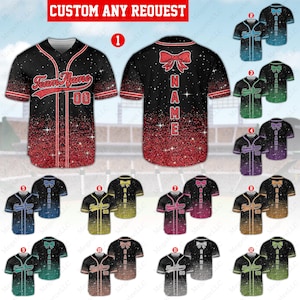 May include: Black baseball jersey with red accents and a glitter effect. The jersey features the text "Team Name" and the number "00". The back of the jersey has the word "NAME" vertically. The image also shows multiple color variations.
