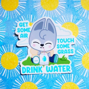 May include: A sticker featuring a cartoon wolf drinking water from a carton. The sticker has a blue background with white sunbursts and the text "Get some air, touch some grass, drink water".