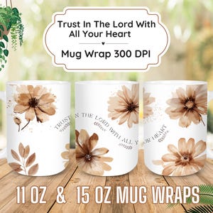 May include: Three white ceramic mugs with a brown floral design and the text "Trust in the Lord with all your heart" printed on them. The mugs are 11 oz and 15 oz.