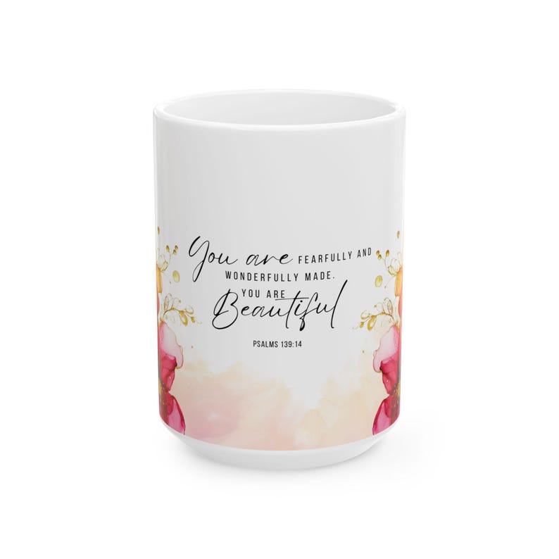 May include: White ceramic mug with a pink and gold floral design. The mug features the text "You are fearfully and wonderfully made. You are beautiful. Psalms 139:14."