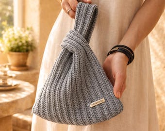 Handgefertigte Knotentasche aus Lurex: Metallic Silber Handgelenktasche