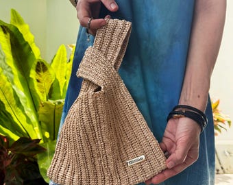 Sac de luxe avec noeud en raphia - Pochette au crochet faite main - Sac à main de créateur d&#39;été bohème - Accessoire de mariage de plage élégant - Cadeau slow fashion