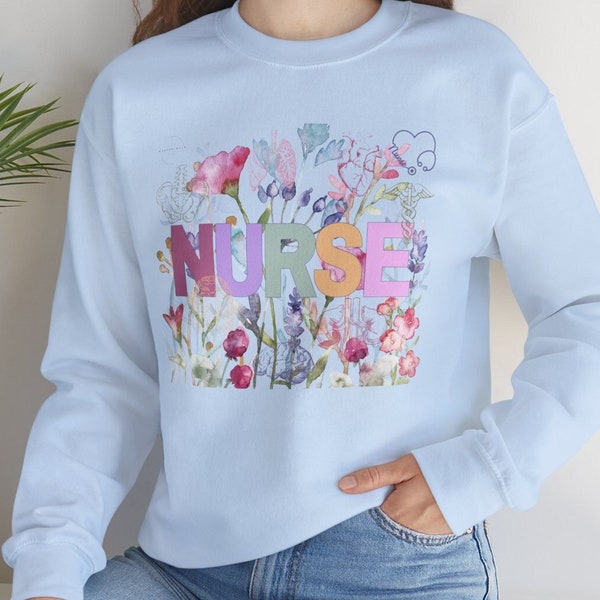 Beautiful Nurse Crewneck Sweatshirt with Poppies in Watercolour, pastel nurse logo, discrete skeleton sketch and body organs, cozy fashion