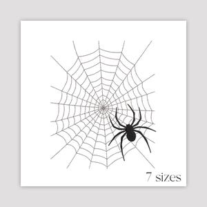 May include: Black spider sitting on a white web with a grey background. The text "7 sizes" is at the bottom of the image.