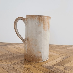 Glazed earthenware pitcher