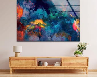 May include: Abstract art print featuring swirling colours of blue, green, yellow, orange, and red. The colours are blended together to create a cloudy, ethereal effect.