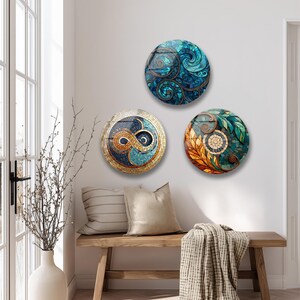 a cozy and inviting living space with a wooden bench, a decorative vase, and three colorful, circular wall art pieces.