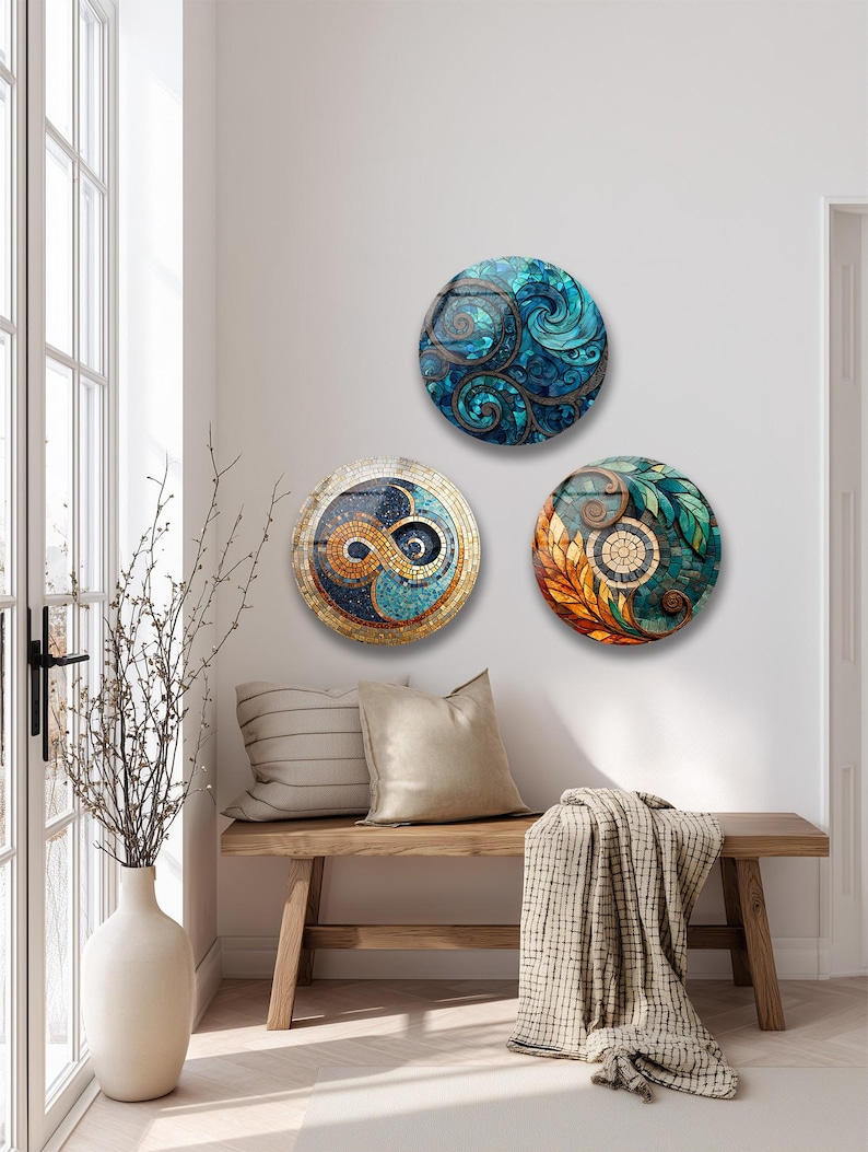 a cozy and inviting living space with a wooden bench, a decorative vase, and three colorful, circular wall art pieces.