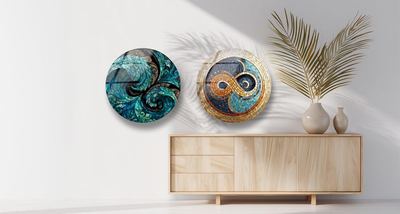 a minimalist interior design with a wooden cabinet, two round wall art pieces, and a potted plant on a white wall.