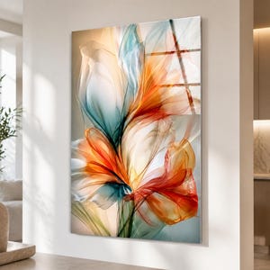 Puede incluir: Una pieza de arte mural rectangular que presenta un diseño floral abstracto con capas fluidas y translúcidas en tonos naranja vibrante, azul verdoso suave y crema. La composición muestra líneas delicadas y curvas.