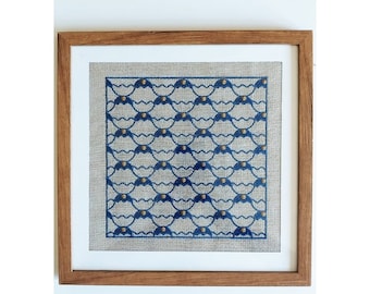 Framed painting with embroidered pattern