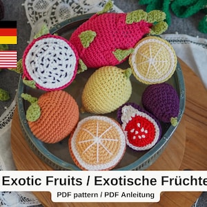 May include: Crocheted fruit amigurumi patterns. The pattern includes a pineapple, orange, lemon, dragon fruit, pear, fig, and a purple fruit. The pattern is available in PDF format.