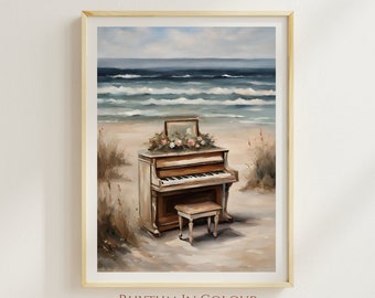 May include: A vintage white piano with a floral arrangement on top sits on a sandy beach with ocean waves in the background. The piano has a wooden stool and is painted in a light, weathered style.