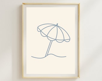 May include: A minimalist line drawing of a blue beach umbrella with a wave underneath, on a cream background. The image is framed in a light wood frame.