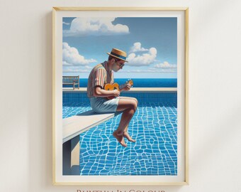 May include: A framed print depicting a person playing a ukulele by a swimming pool. The person is wearing a hat and sunglasses. The background shows a blue pool, the sea, and a sky with clouds. The print has the text "RHYTHM IN COLOUR" and "PRINTS FOR MUSIC LOVERS".