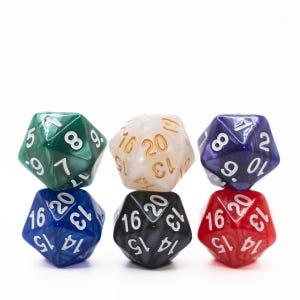 May include: Six multi-sided dice in various colors, including green, white, blue, black, and red. Each die has white or gold numbering. The dice are arranged in two stacks of three, with a white background.