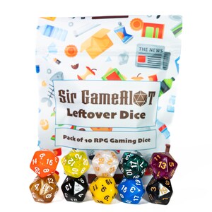 May include: A bag of "Sir GameAlot Leftover Dice" with a variety of colorful RPG gaming dice. The dice are in various colors, including orange, yellow, white, green, blue, and purple. The bag says "Pack of 10 RPG Gaming Dice."