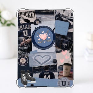 May include: A collage-style tablet case featuring hockey-themed imagery. The design includes a heart, hockey sticks, skates, and the text "In My Hockey Romance Era." The color scheme is primarily blue and white.
