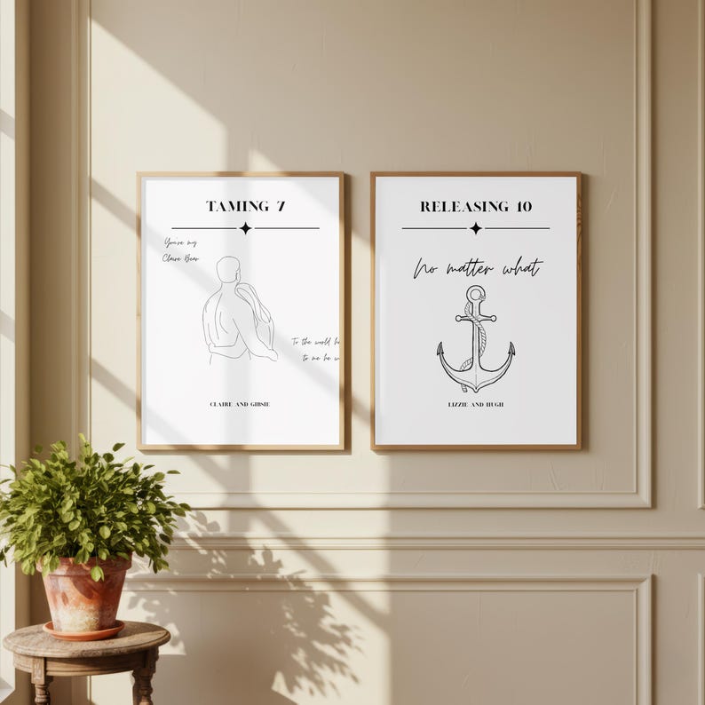 May include: Two framed wall art prints with white backgrounds and black line art. The left print features a couple embracing with the text TAMING 7, You're my Claire Bear, and CLAIRE AND GIBSIE. The right print shows an anchor with the text RELEASING 10, No matter what, and LIZZIE AND HUGH.
