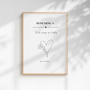 May include: A framed vertical wall art print featuring black text and a line art illustration on a white background. The text reads REDEMING 6, I'll be seeing ya Malloy, and JOEY AND AOIFE. A single line heart and flower icon sits in the center.