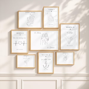 May include: A gallery wall set of eight framed prints with light wood frames, featuring black line art illustrations and text on white backgrounds. The prints include maps, romantic couple sketches, an anchor, and quotes like Binding 13.