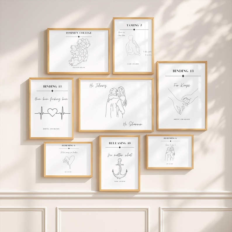 May include: A gallery wall set of eight framed prints with light wood frames, featuring black line art illustrations and text on white backgrounds. The prints include maps, romantic couple sketches, an anchor, and quotes like Binding 13.