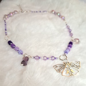Purple moth necklace with pearls