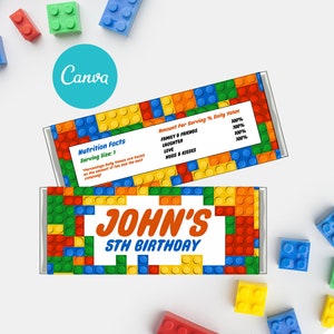 May include: A colorful printable chocolate bar wrapper with a Lego-themed design. The wrapper features a nutrition facts label with the text "Nutrition Facts" and "Serving Size: 1". The wrapper also includes a section for "Amount Per Serving % Daily Value" with the text "Family & Friends", "Laughter", "Love", and "Hugs & Kisses". The wrapper has the text "JOHN'S 5TH BIRTHDAY" in orange and blue letters.