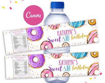 May include: Two white water bottle labels with a donut theme. The labels feature pink, purple, and blue donuts with sprinkles and gold accents. The text on the labels reads "Kathryn's Sweet 5th Birthday".