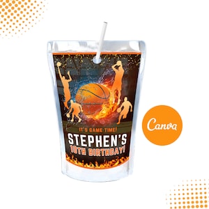 Pode incluir: Caixa de suco laranja e preta com tema de basquete com um canudo. A caixa de suco tem uma bola de basquete com chamas e silhuetas de jogadores de basquete. O texto na caixa de suco diz "É hora de jogar! O 10º aniversário de Stephen!"