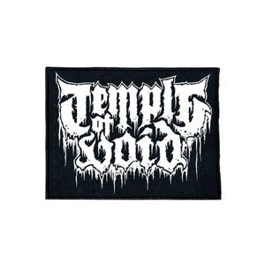 May include: Black and white embroidered patch with the text "Temple of Void" in a gothic font.