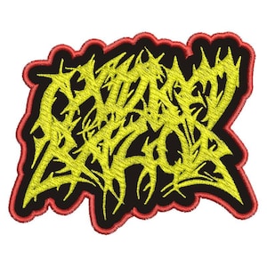 Puede incluir: Parche bordado amarillo con la palabra "GRIME" en una fuente estilizada y dentada. El parche tiene un borde rojo.