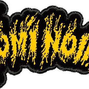 May include: Black and yellow embroidered patch with the word "VOMIT NOW" in a splatter design.