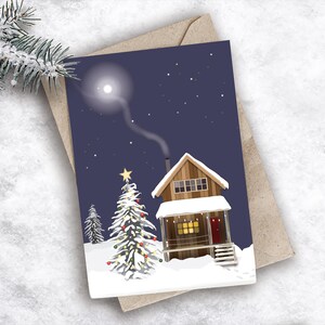 Christmas log cabin | greetings card | pine tree | winter scene | snowy forest | moonlit scene | illustrated christmas card