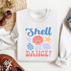 Shell We Dance T-Shirt | Retro Beach Vacation Tee | Cute Ocean Lover Starfish Shirt | Coastal Mermaidcore Gift For Her Summer