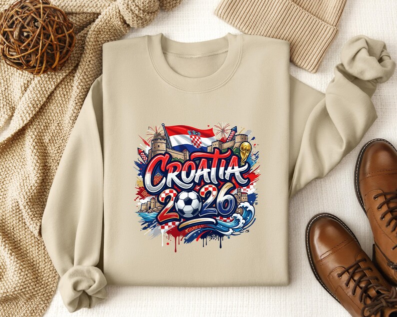 Crewneck sweatshirt with "Croatia 2026" text and soccer imagery.