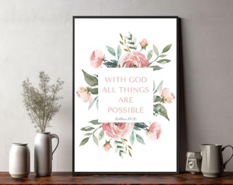 May include: A white printable art print with a watercolor floral design in shades of pink and green. The print features the text "With God all things are possible" with the scripture reference "Matthew 19:26".