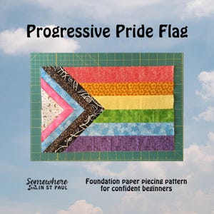 May include: A Progressive Pride flag quilt block featuring horizontal stripes in red, orange, yellow, green, blue, and purple, with a chevron pattern on the left in white, pink, light blue, brown, and black. Text reads Progressive Pride Flag.