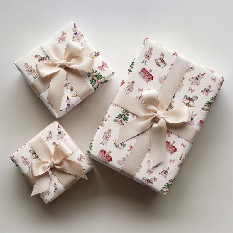 Christmas wrapping paper with watercolor nutcrackers, ballerinas, bows, rocking horses, and Christmas trees, with pastel details.