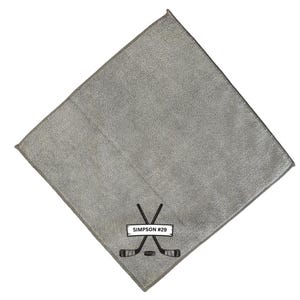 May include: Gray microfiber cleaning cloth with a black embroidered hockey stick design and the text "SIMPSON #29".